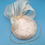 Thumbnail: Marji - Cream embroidered silk button headpiece with silk abaca bow and pearls