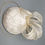 Thumbnail: Marji - Cream embroidered silk button headpiece with silk abaca bow and pearls
