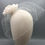 Thumbnail: Claudia - White handmade silk flower on a headband with birdcage veil