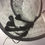 Thumbnail: Black and White -Ascot spiral hat in black and white sinamay on a white button