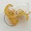 Thumbnail: Emma -Yellow sinamay headpiece trimmed with white and yellow