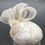 Thumbnail: Marji - Cream embroidered silk button headpiece with silk abaca bow and pearls