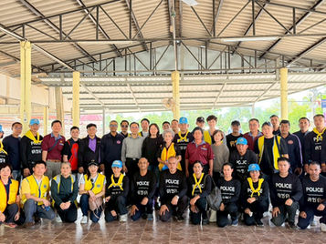 IBCfirm lawyers and partners delivering humanitarian aid and relief supplies to flood victims in Hat Yai, Songkhla Province, Thailand, demonstrating cross-border humanitarian support and social responsibility.