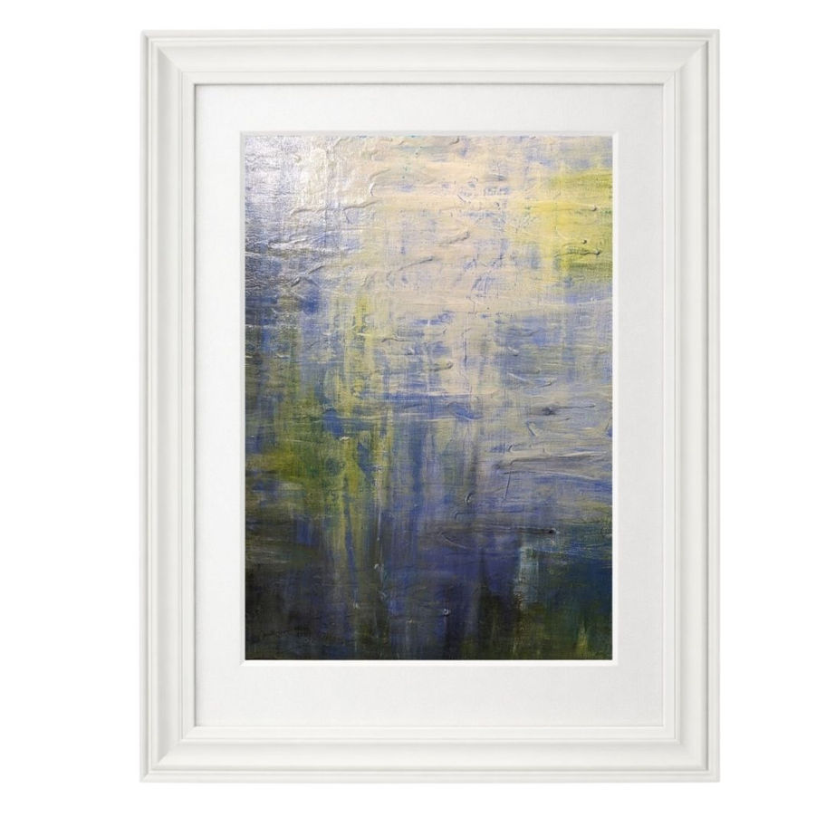 Abstract blue and yellow painting in a white frame