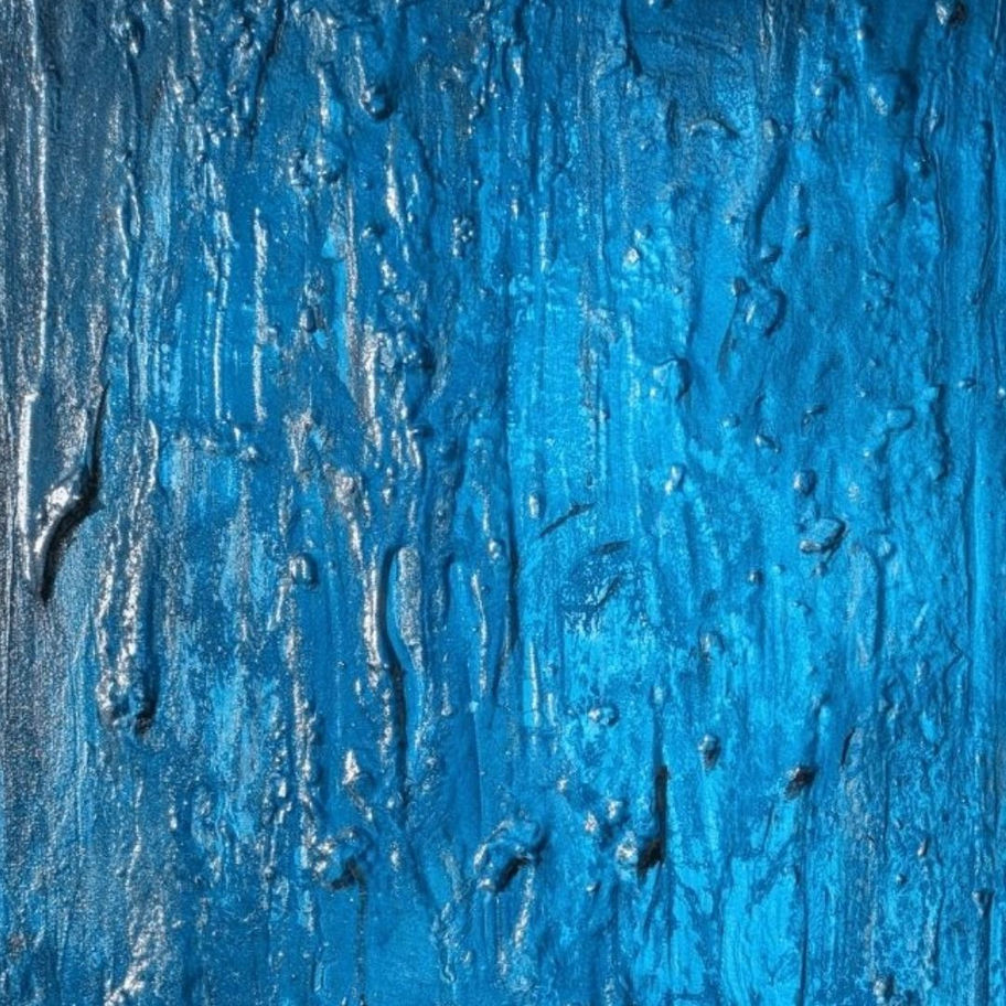 Textured blue paint with drips