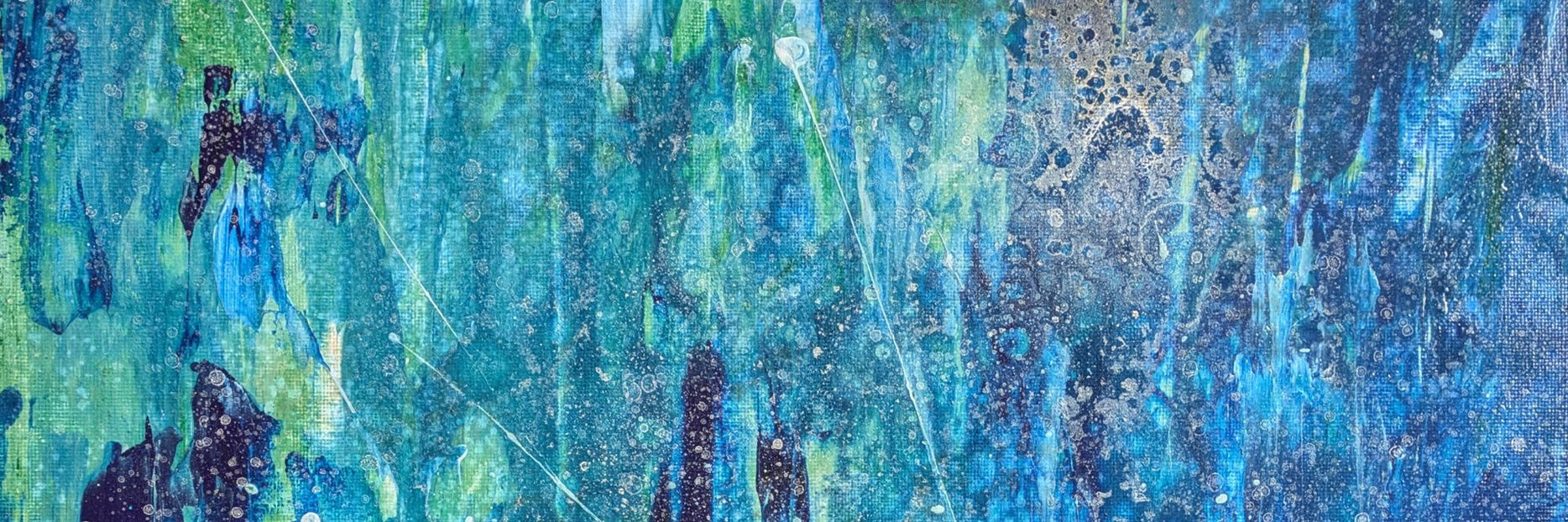 Abstract process art with vibrant blue and green paint drips and texture.