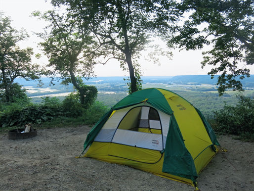 Campsite above river confluence.