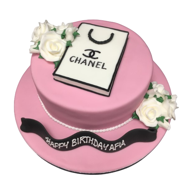 Bespoke cake shaped like a Chanel bag adorned with pink roses, crafted for celebration in Solihull, West Midlands.