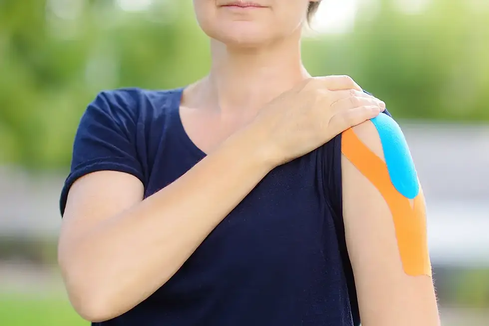 woman-with-kinesio-tape-on-her-shoulder-kinesiolo-2023-11-27-05-02-32-utc.webp