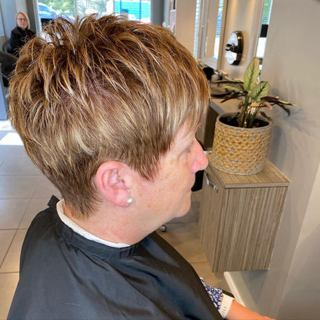 A woman with a pixie haircut at Shear Shak, Spalding. 