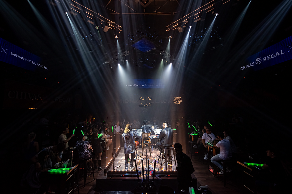 Live music restaurant Penang with band performing under spotlights