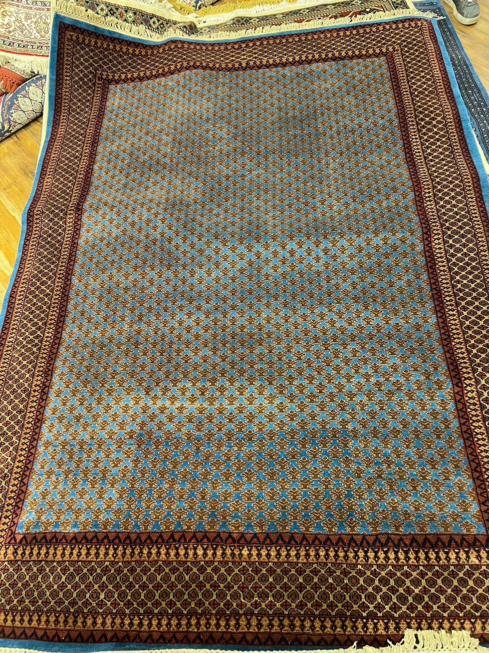 2 metre by 3 metre modern pattern dark blue red tones made from wool and silk 300 knots per square inch