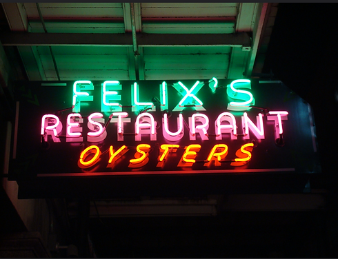Neon sign hanging in front of Felix's Restaurant & Oyster Bar in New Orleans, LA