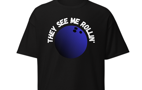 t-shirt that has a blue bowling ball and curved letters reading "they see me rollin'"