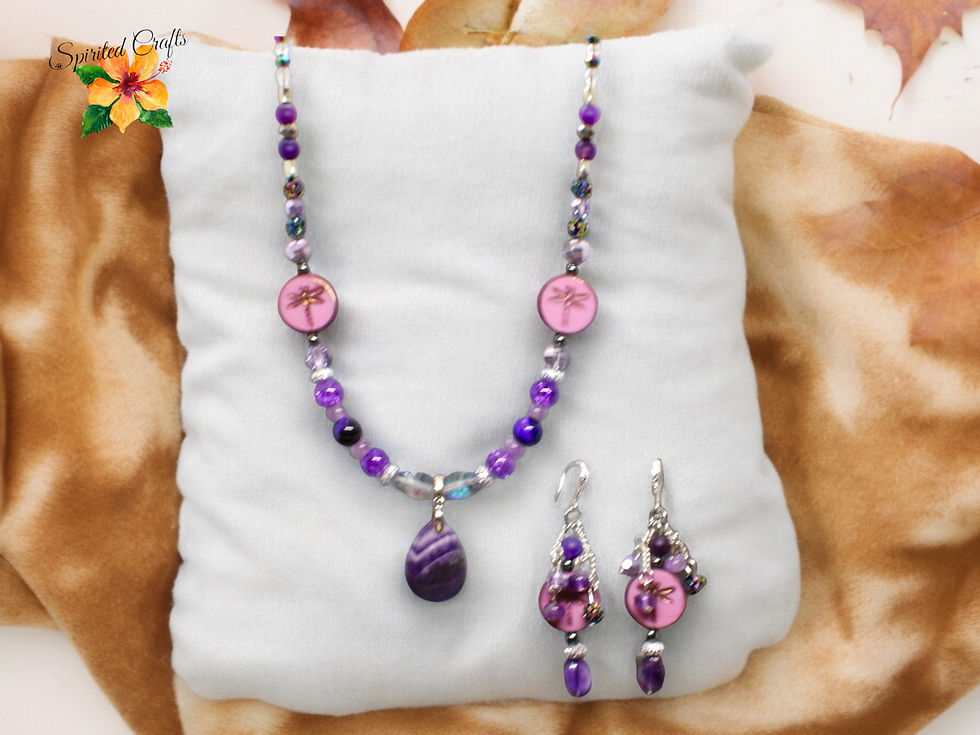 Thumbnail: Amethyst Dragonfly jewelry set on a pillow