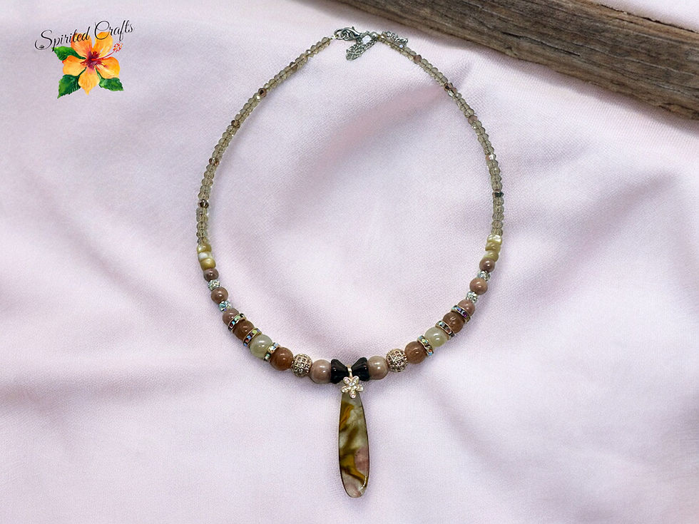 Strawberry quartz and sunstone necklace on a cloth