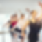 5 adult dancers at the barre.