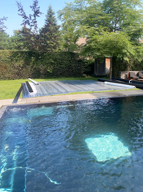 demontage van bestaand zwembadrolluik