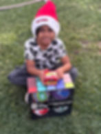 scott-cole-plumbing-holiday-toy-donation-child.jpeg
