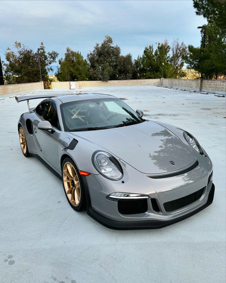 Silver Porsche 911 GT3 RS with gold wheels and custom wrap in Temecula, CA