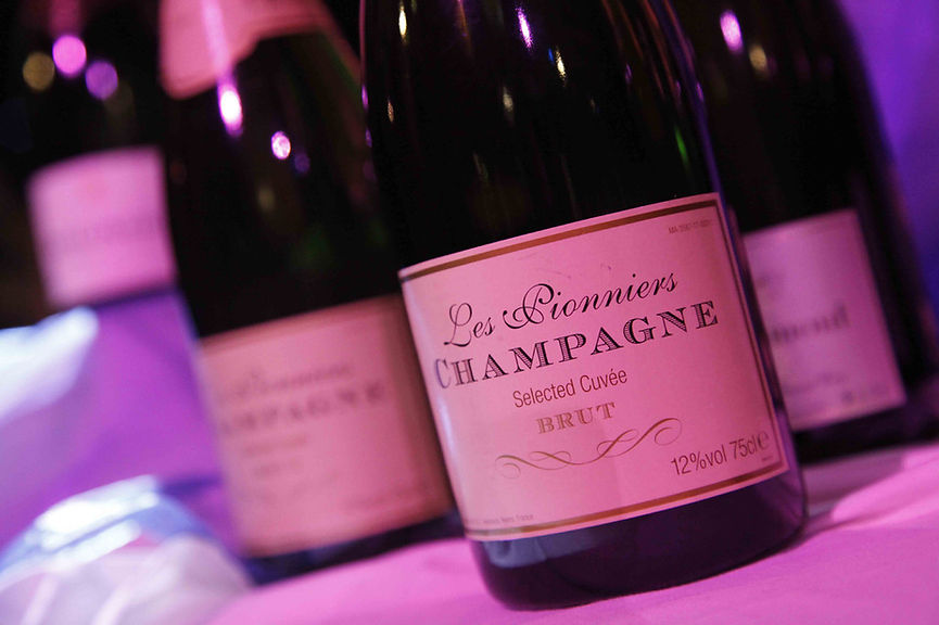 close up photo of a champagne bottle lable