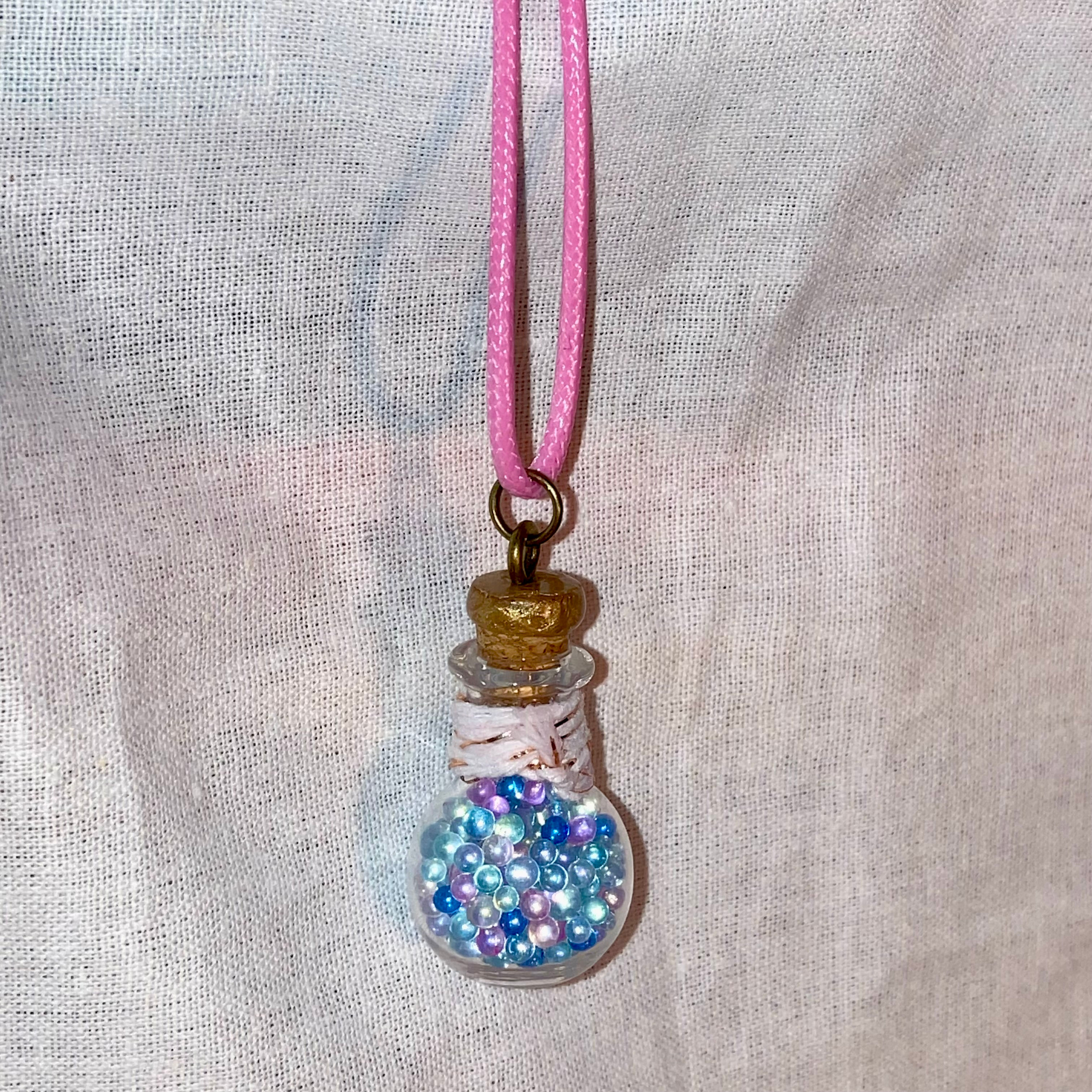 Miniature bottle necklace with blue fairy bubble bath