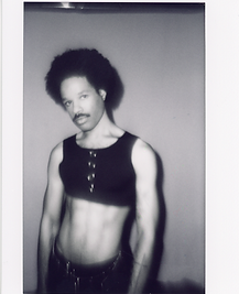 A torso shot of the model staring into the camera