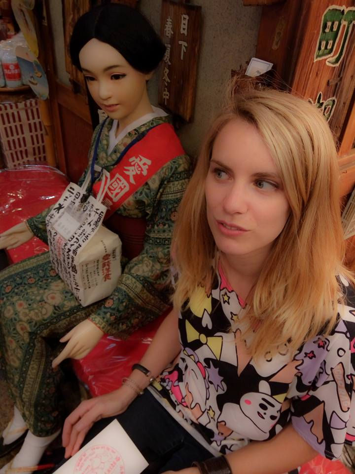 Photo taken in a quirky Kyoto restaurant in 2016, showing a mannequin dressed in traditional clothes sitting next to a visitor.