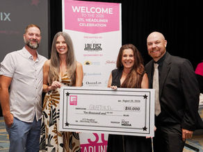 Grafton IL leaders holding $10,000 STL Headliner award for best day trip near St Louis