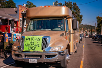 Witches with Wands Only bus at parade