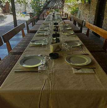Long table set for a meal with benches_edited.jpg