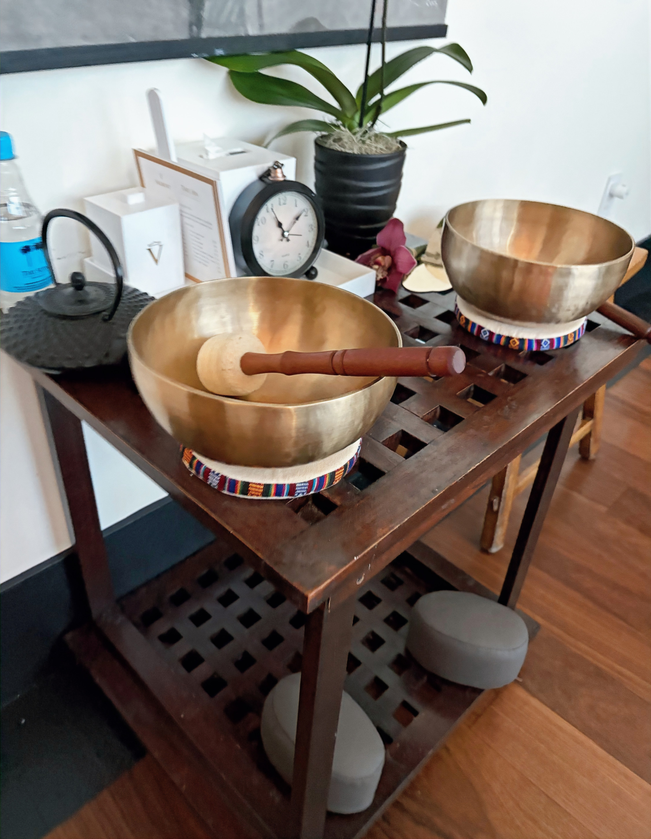 Sound bowls poised to produce calming vibrations for relaxation.