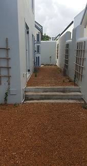 Another closer view of the steps leading to the jagged paved area, finished.