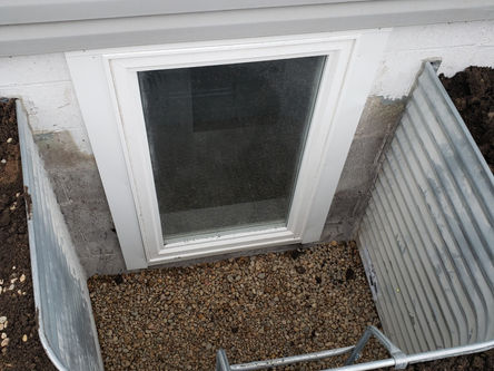 basementwindowwell.jpg