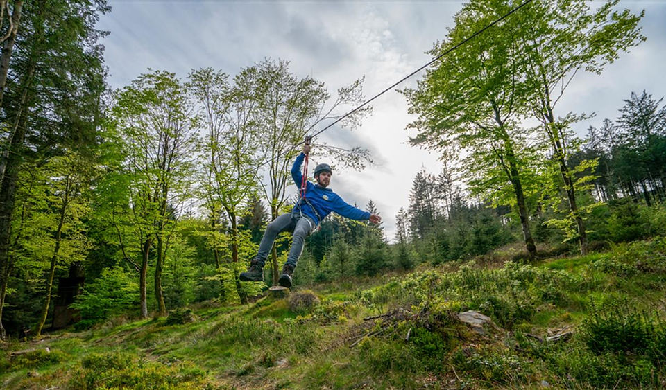 Someone on the zip line at Ape Mann