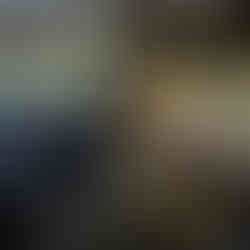 Inside camper, side table out with side lights on