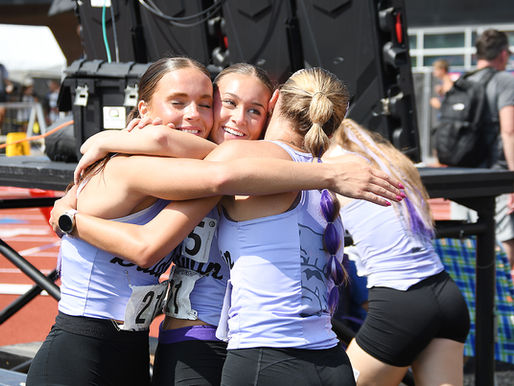 The Baldwin girls 4x800 relay celebrates setting a Class 4A state record.