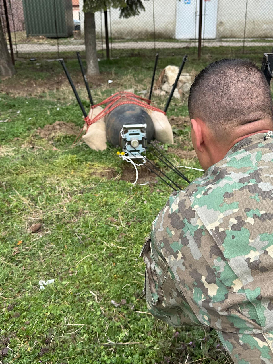An EOD Technician about to deploy the Multi Role Rocket Wrench to a UXO