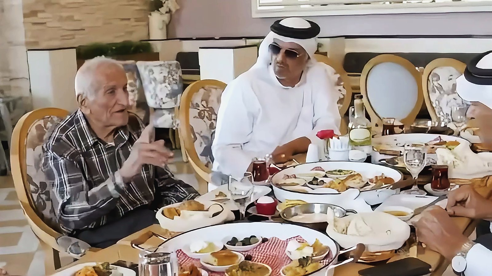A Muharraq elder telling his story over tea