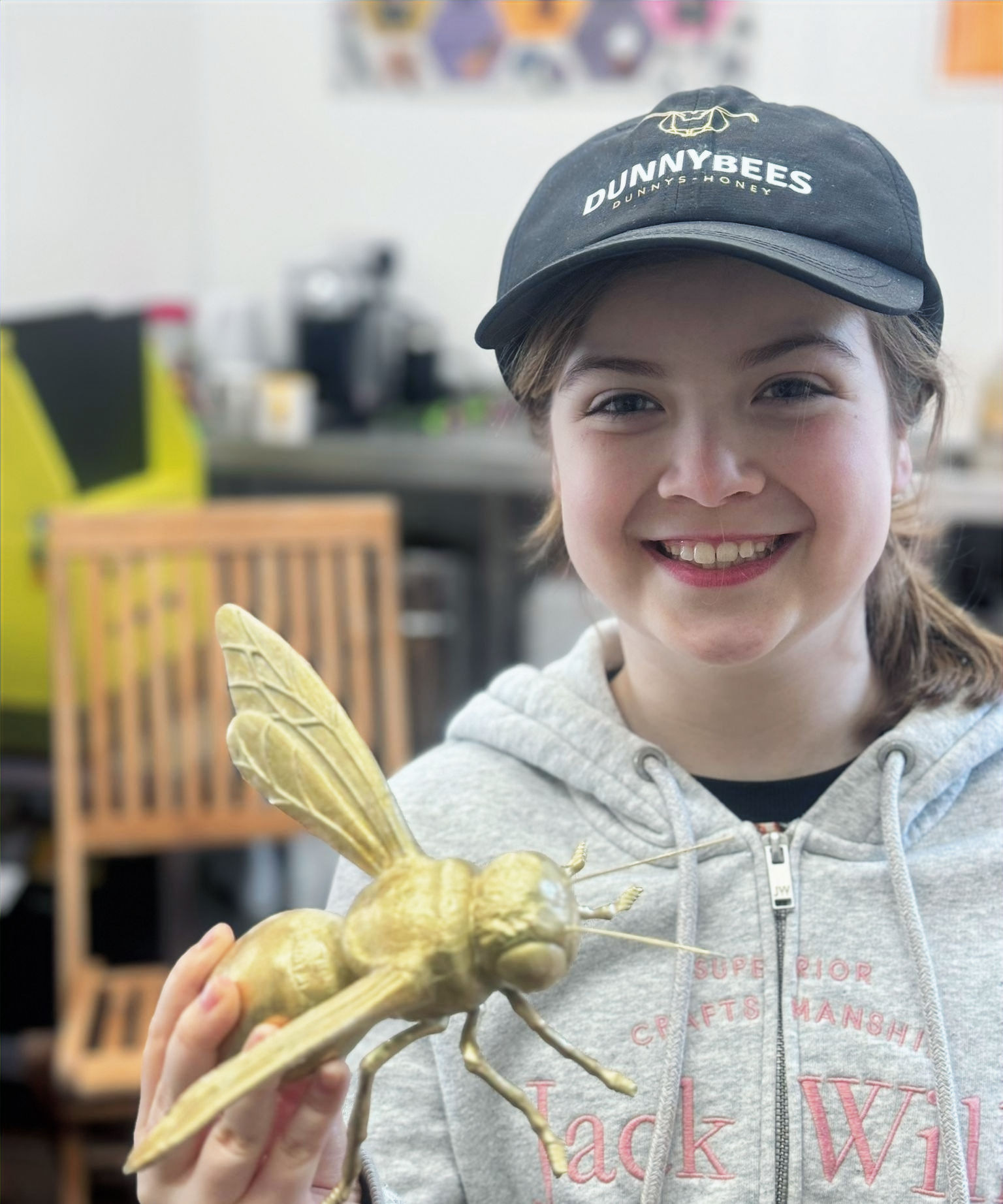 Child holding our DunnyBees mascot