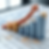 3D bar chart with an upward arrow representing growth on a financial document.