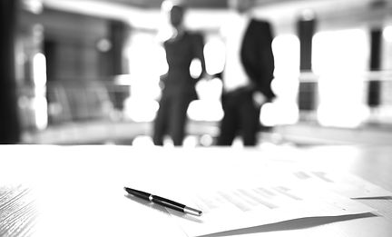 Documents%20and%20Blurred%20Business%20M