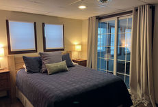 The Lake House includes a two bedrooms with queen-sized beds and quality linens.