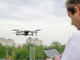 Home inspector operating a commercial drone to conduct a roof inspection for a Schedule C tax deduction