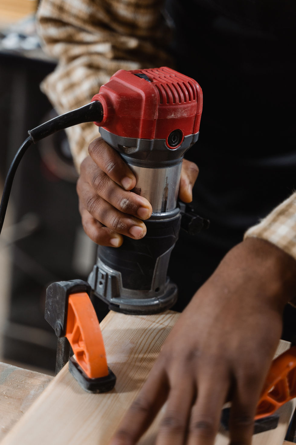 A palm router in action on a profile