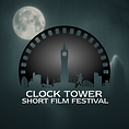 Full moon illuminating shadowy figure around the Leicester Clock Tower