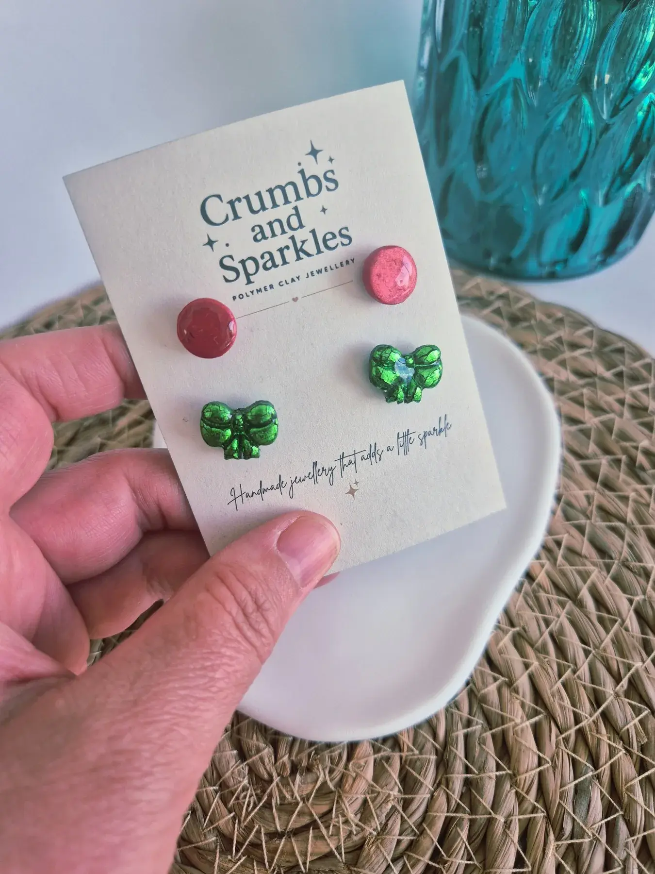 Handmade red and green Christmas bow polymer clay stud earrings