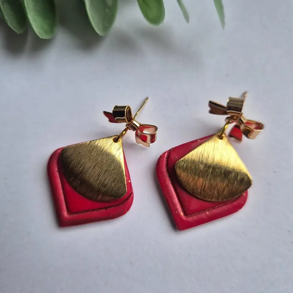 Thumbnail: Festive red and gold bow earrings for Christmas party