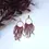 Thumbnail: Statement fringe earrings with red and gold beads