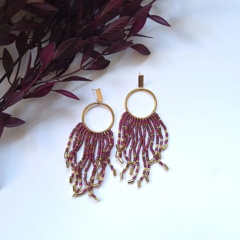 Statement fringe earrings with red and gold beads